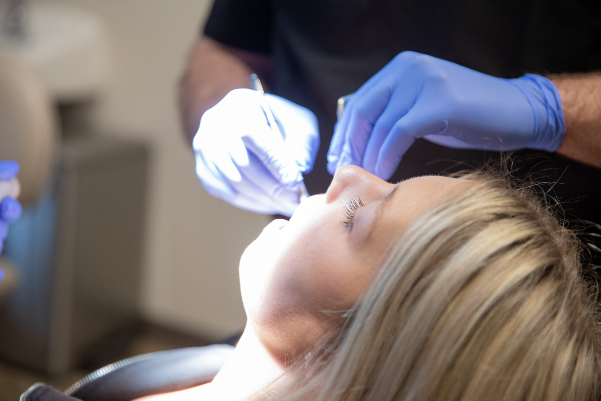 young woman having a dental procedure