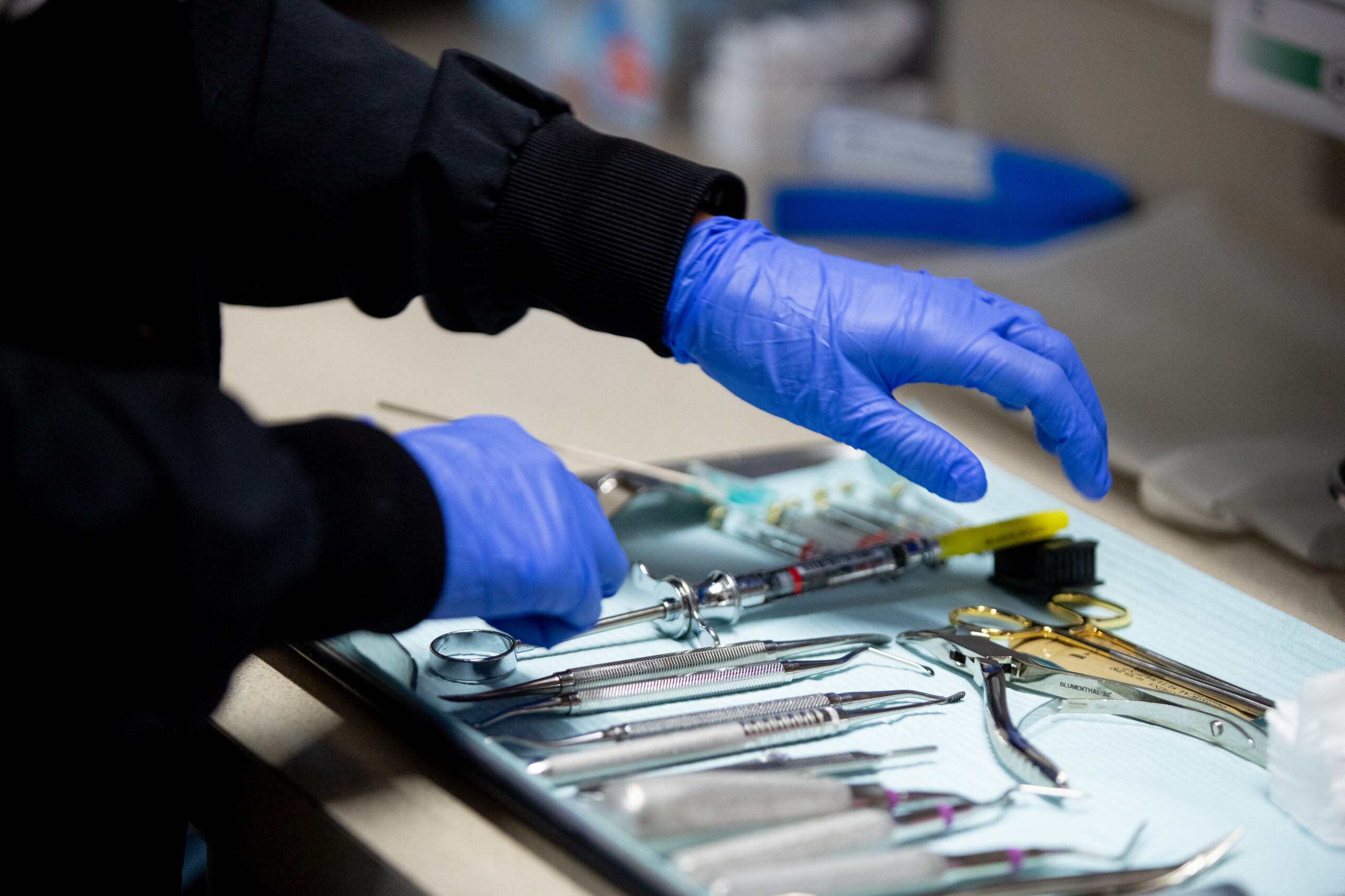 surgeon preparing surgical tools