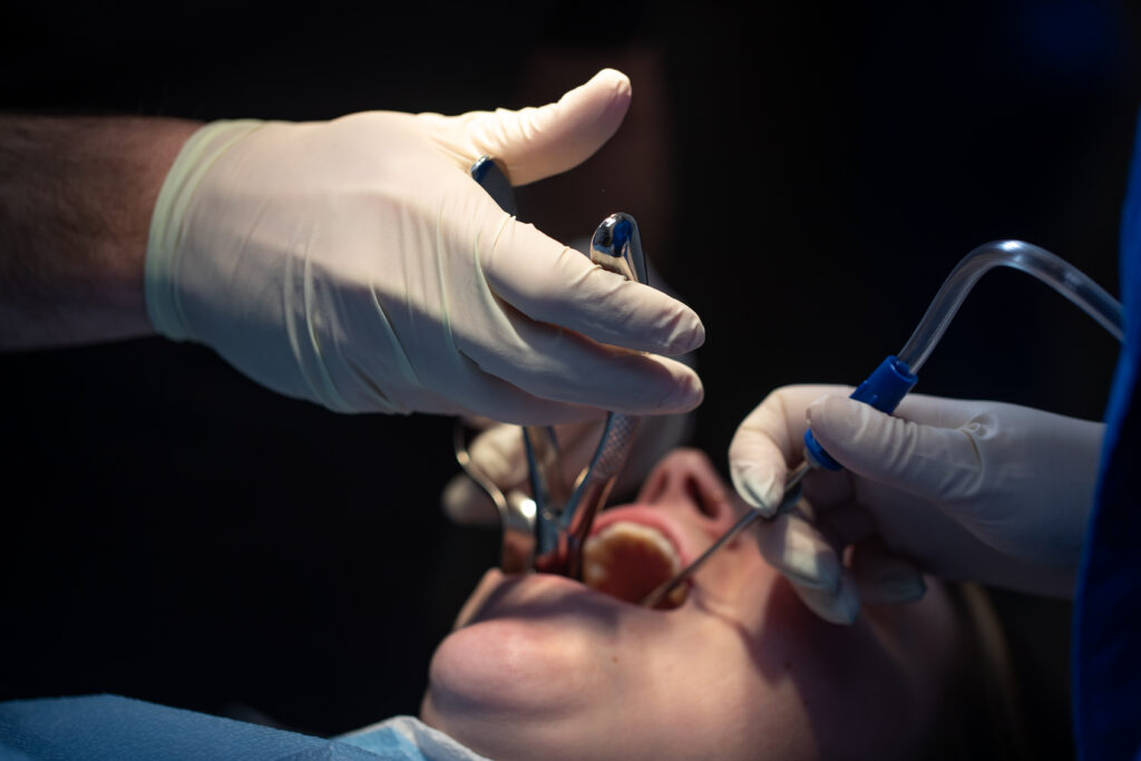 patient in the process of receiving oral surgery